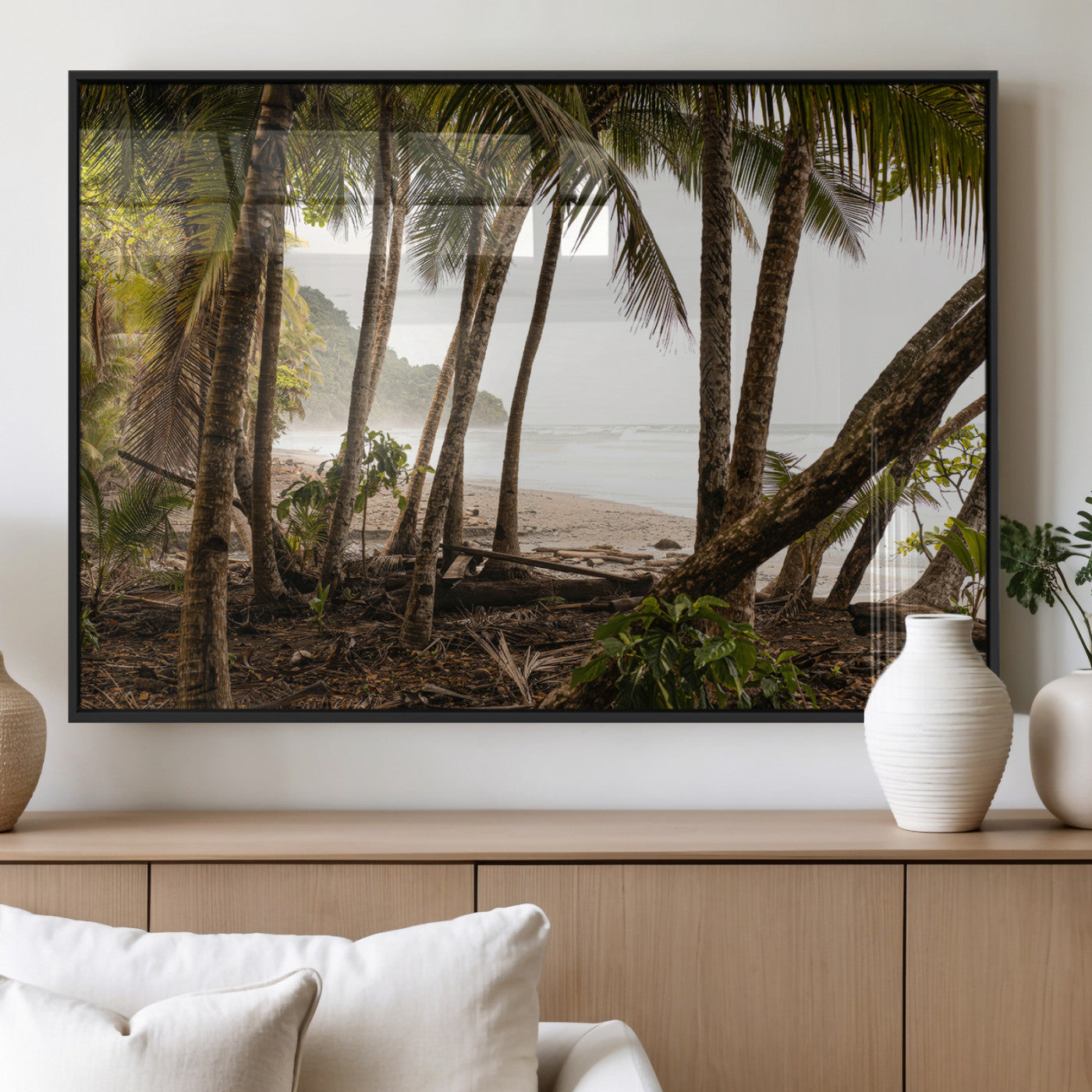 Dense tropical palm trees framing a sandy beach and ocean shore, ideal for jungle or coastal themed interior wall decor.