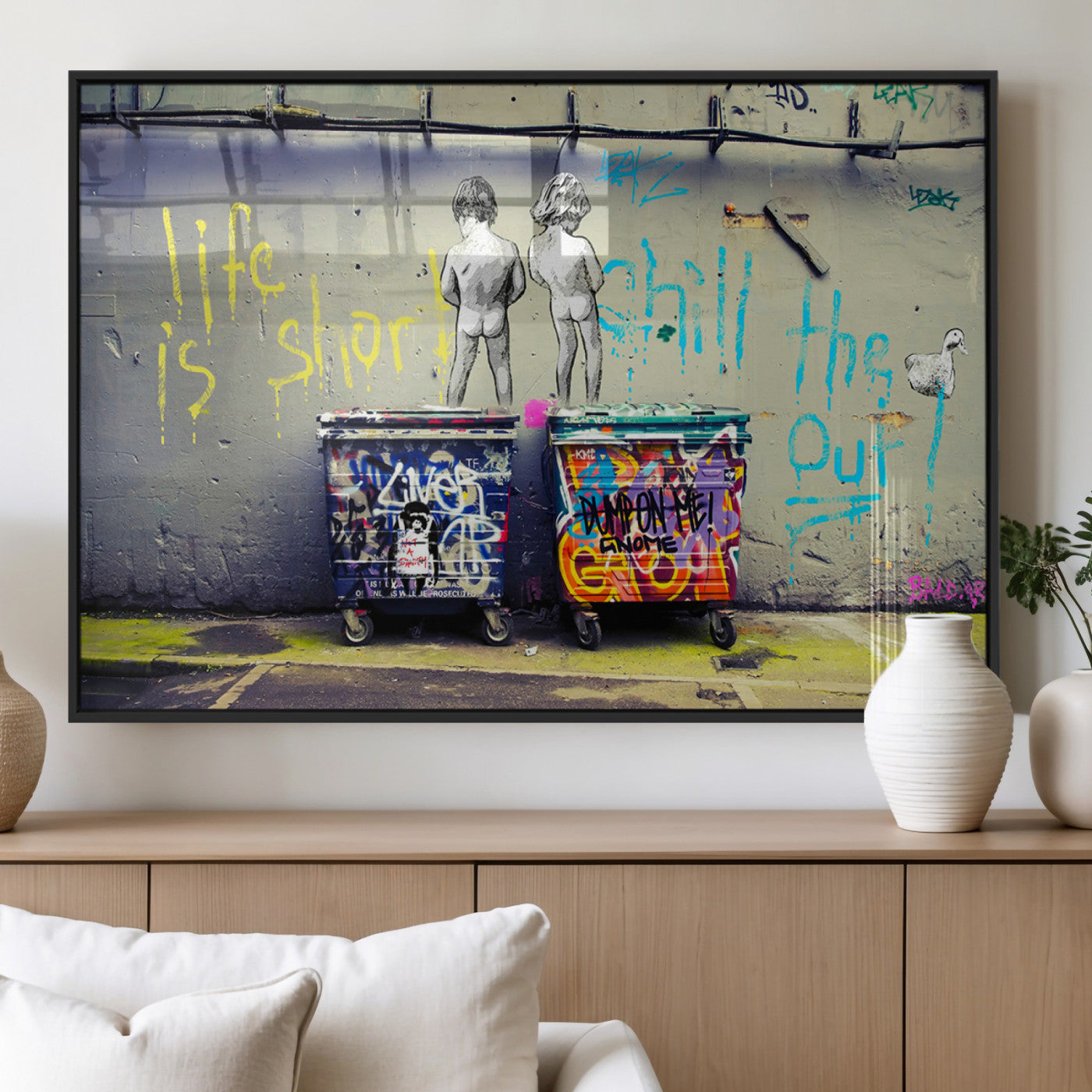Graffiti-style canvas art with bold text and two naked figures over urban dumpsters, ideal for edgy or street-style decor.