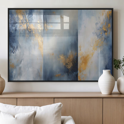 Abstract canvas art in soft blue and gold tones with textured brushstrokes, ideal for elegant or modern neutral decor spaces.