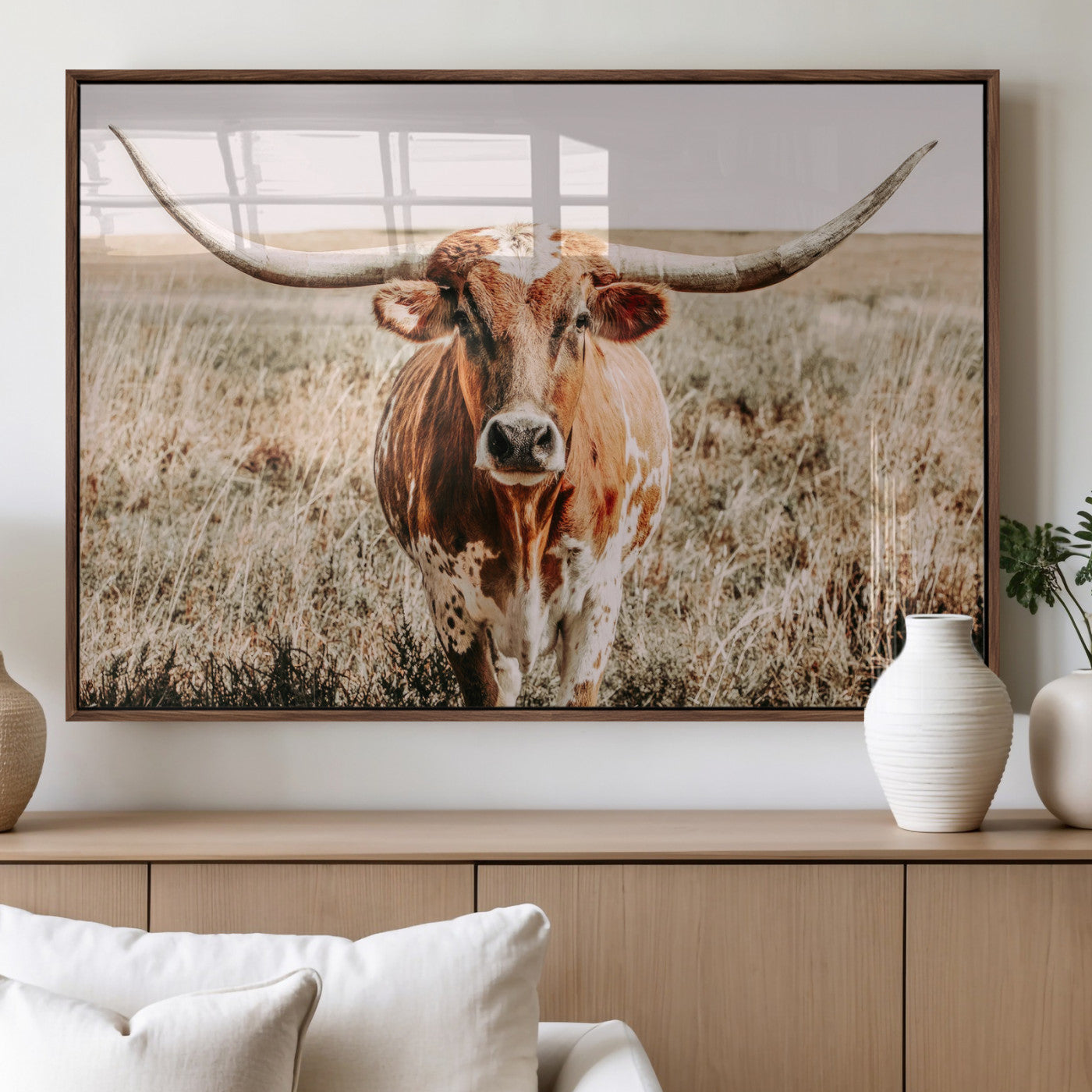Framed longhorn cow canvas wall art with rustic prairie background, western animal print perfect for farmhouse or ranch style decor