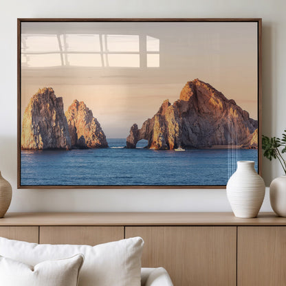 Framed canvas of El Arco rock formation in Cabo San Lucas at golden hour, ideal for coastal landmark or ocean-inspired decor.
