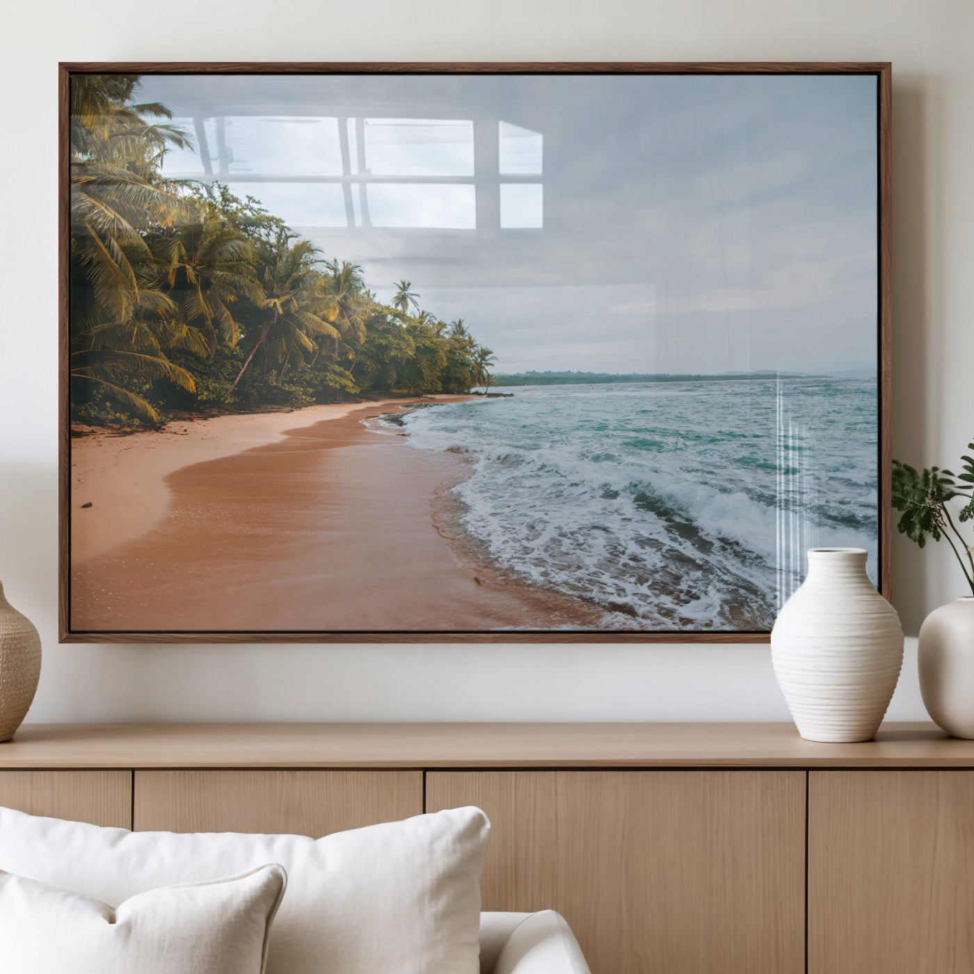Framed canvas of a tropical beach with palm trees and soft waves, ideal for coastal escape or serene nature-inspired home decor.