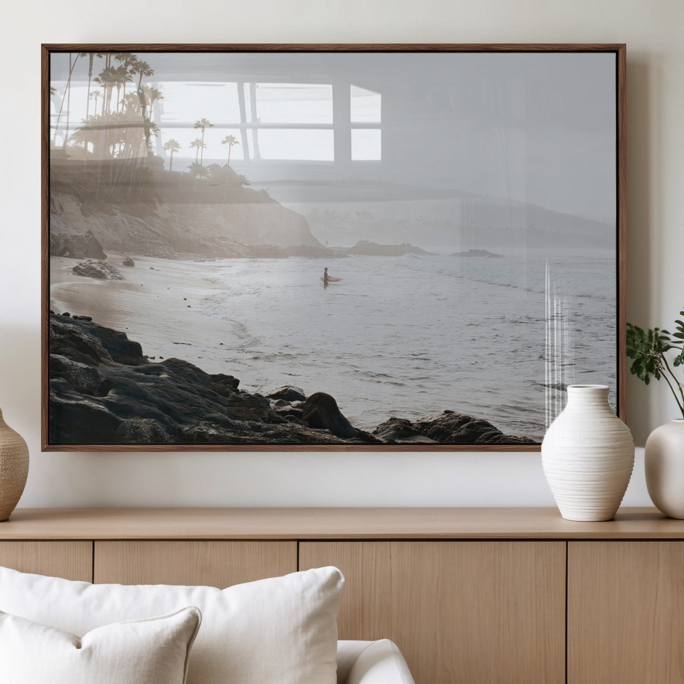 Framed canvas of a surfer in misty coastal tones at a foggy California beach, ideal for minimalist coastal beach or serene ocean-themed decor.