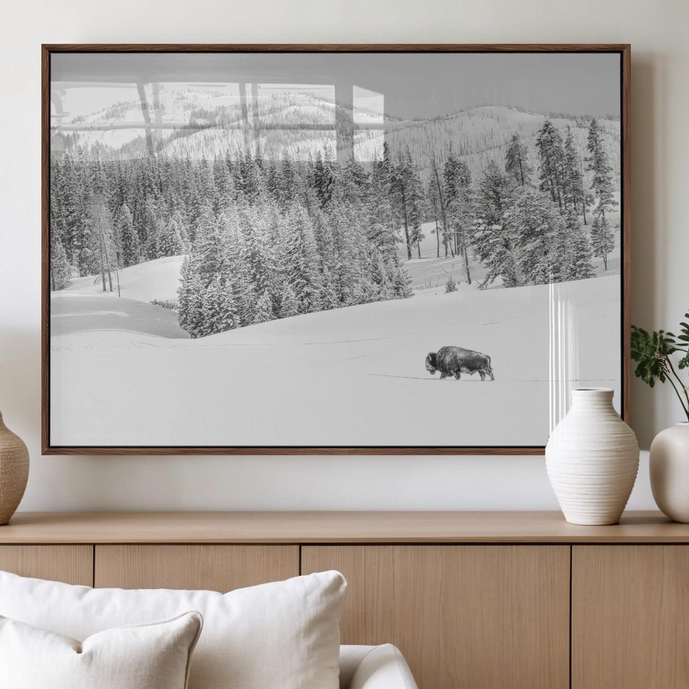 Snowy bison walking through white forest landscape, ideal for monochrome winter or wilderness-style interior wall decoration.