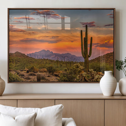 Vibrant desert sunset with saguaro cacti and distant mountains, perfect for Southwestern or warm-toned home decor.