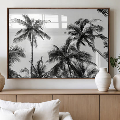 Black and white canvas of tall palm trees in moody tones, perfect for modern tropical minimalist or coastal-style home decor.