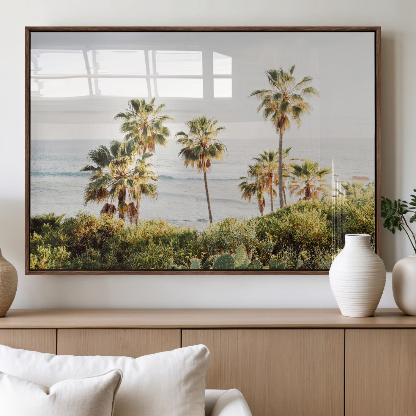 Framed print of sunlit palm trees on the California coast with warm tones, perfect for coastal minimalist or beach-style home decor.