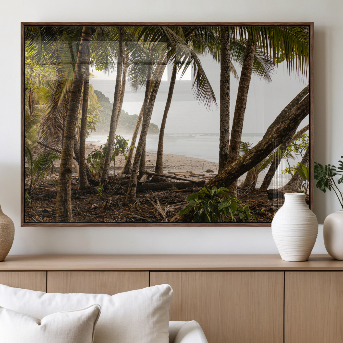 Dense tropical palm trees framing a sandy beach and ocean shore, ideal for jungle or coastal themed interior wall decor.