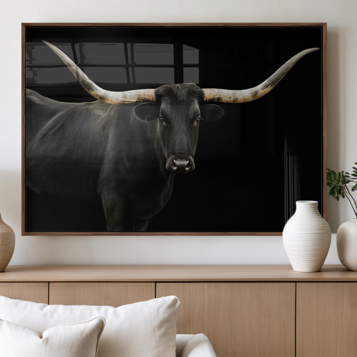 Close-up of a black Texas longhorn with large curved horns on black background, ideal for rustic farmhouse or modern western interiors.