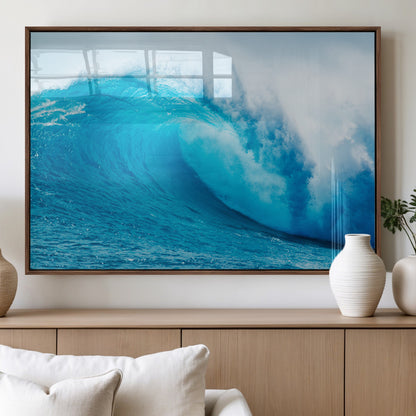 Vibrant canvas of a powerful curling ocean wave in tropical blue tones, perfect for coastal or surf-inspired decor settings.