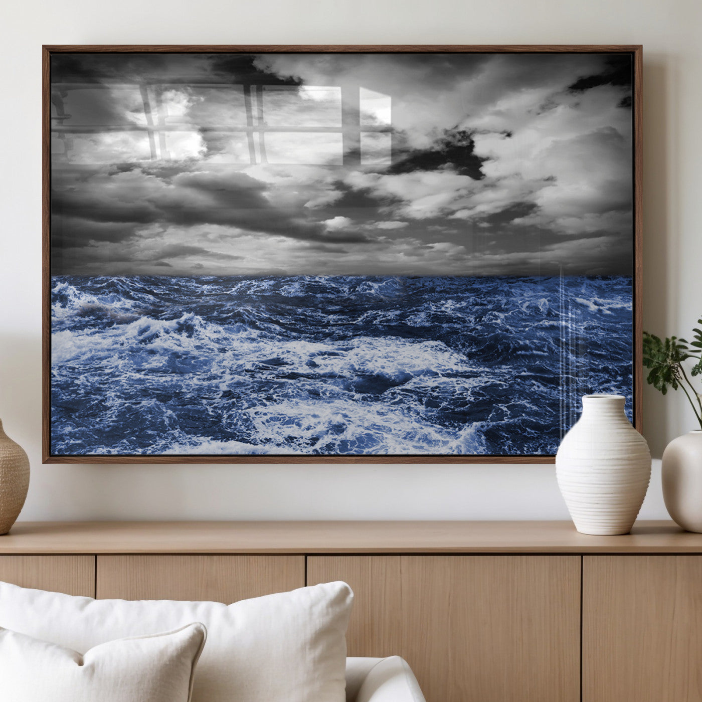 Moody canvas wall art of a stormy ocean under a dramatic black-and-white sky, perfect for bold or coastal-style interiors.