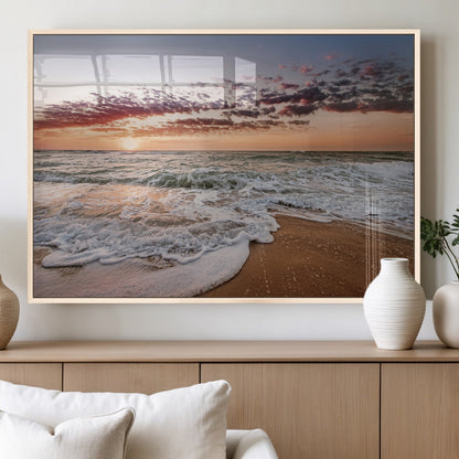 Canvas of a sunset over a foamy ocean shore with warm light and gentle waves, ideal for coastal or beach-themed home decor.