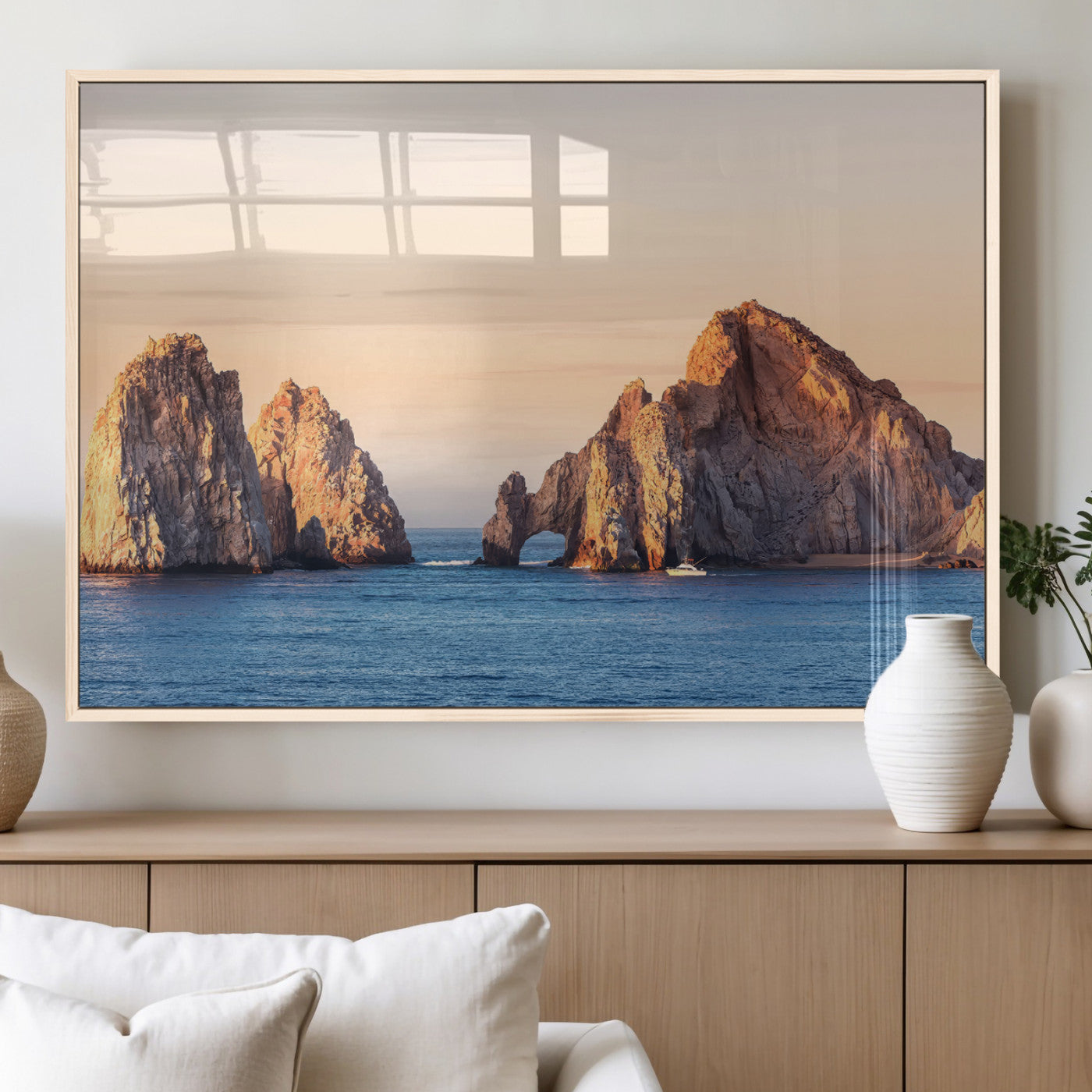 Framed canvas of El Arco rock formation in Cabo San Lucas at golden hour, ideal for coastal landmark or ocean-inspired decor.