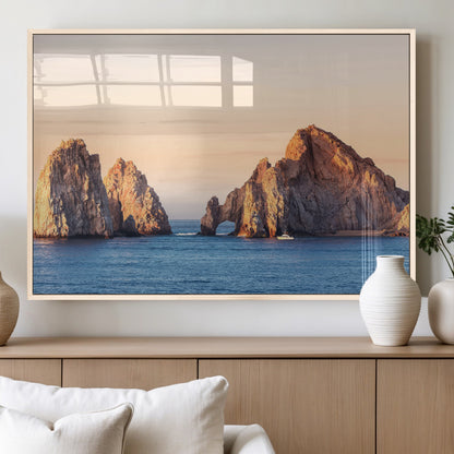 Framed canvas of El Arco rock formation in Cabo San Lucas at golden hour, ideal for coastal landmark or ocean-inspired decor.