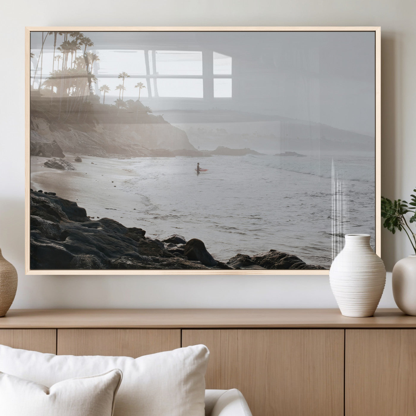 Framed canvas of a surfer in misty coastal tones at a foggy California beach, ideal for minimalist coastal beach or serene ocean-themed decor.