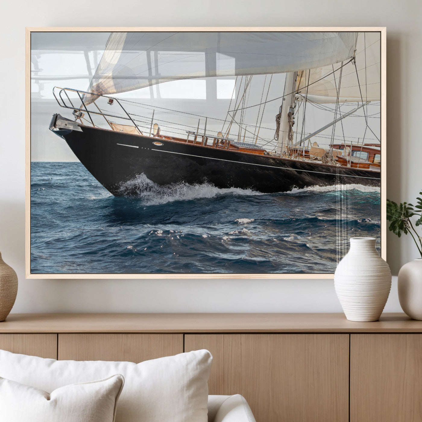 Close-up of a classic sailing yacht with wooden deck and full sails, perfect for nautical or coastal-style decor in ocean-themed spaces.