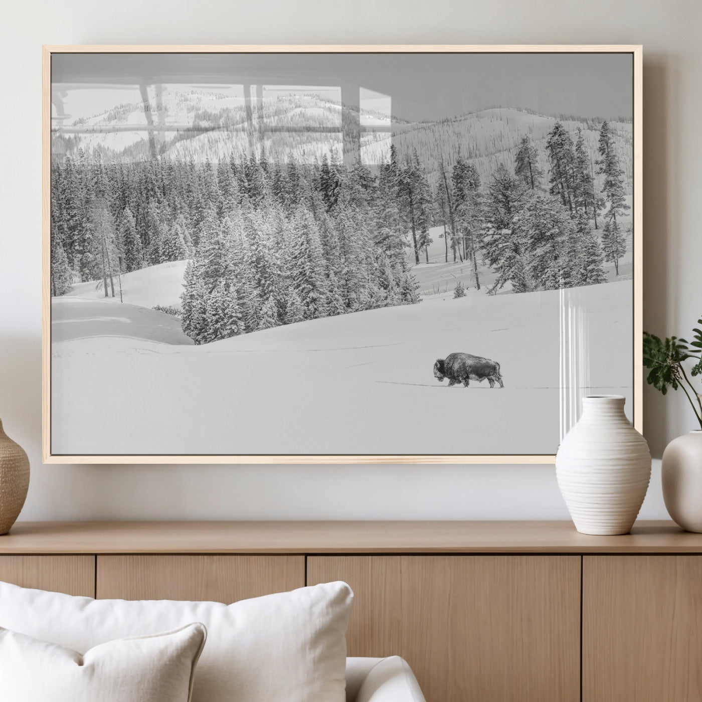 Snowy bison walking through white forest landscape, ideal for monochrome winter or wilderness-style interior wall decoration.