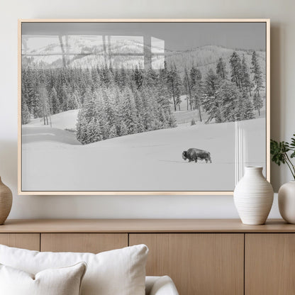 Snowy bison walking through white forest landscape, ideal for monochrome winter or wilderness-style interior wall decoration.