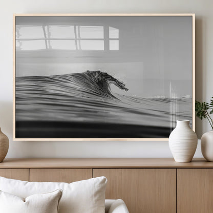 Striking black and white photo of a curling wave, ideal for modern coastal or minimalist wall decor settings.
