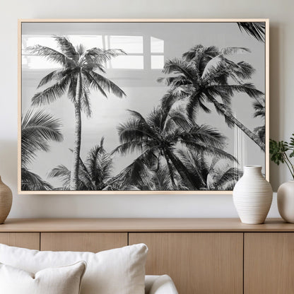 Black and white canvas of tall palm trees in moody tones, perfect for modern tropical minimalist or coastal-style home decor.