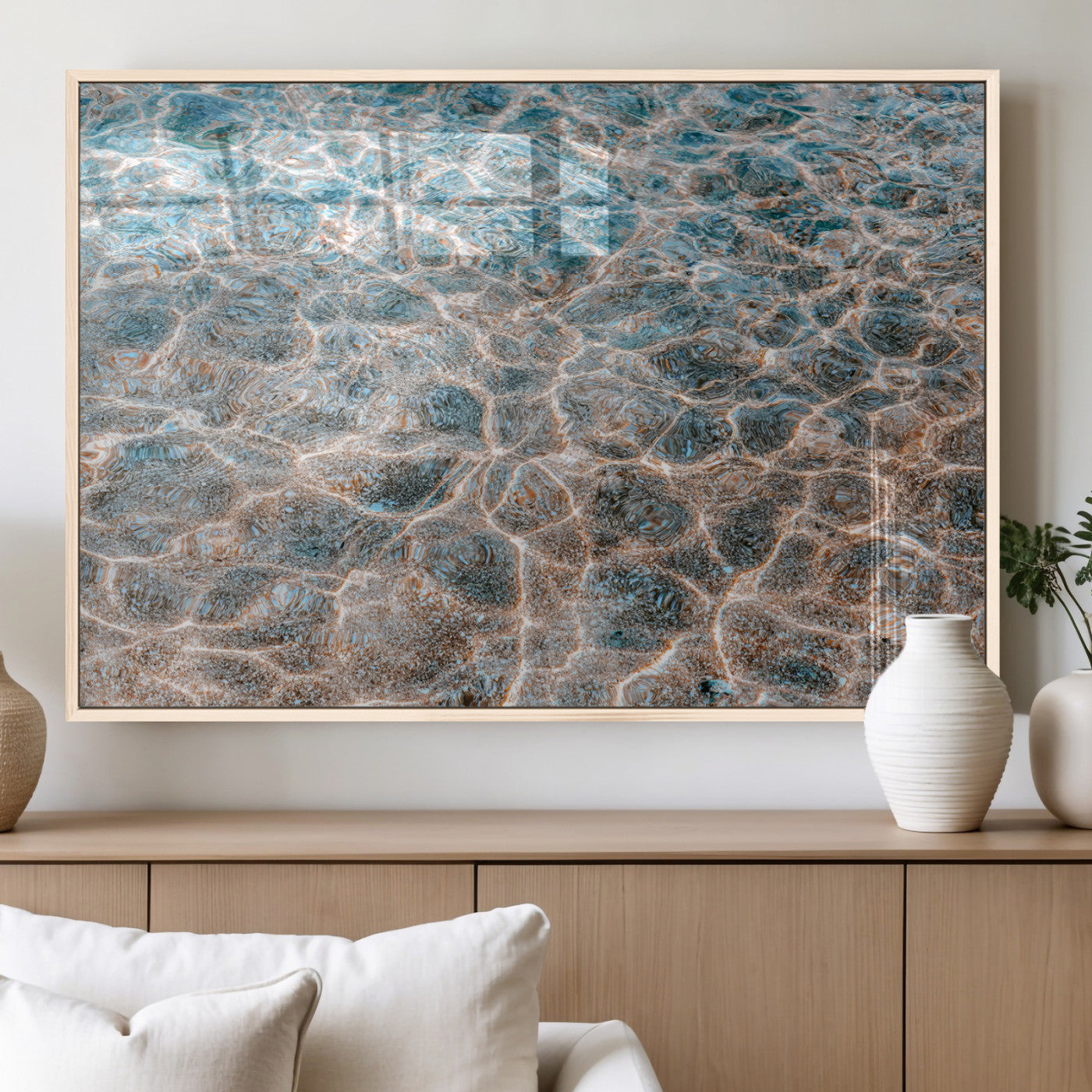 Close-up of sunlit ocean ripples with aqua blue and golden tones, ideal for modern coastal or minimalist home decor.