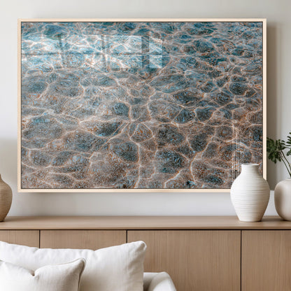 Close-up of sunlit ocean ripples with aqua blue and golden tones, ideal for modern coastal or minimalist home decor.