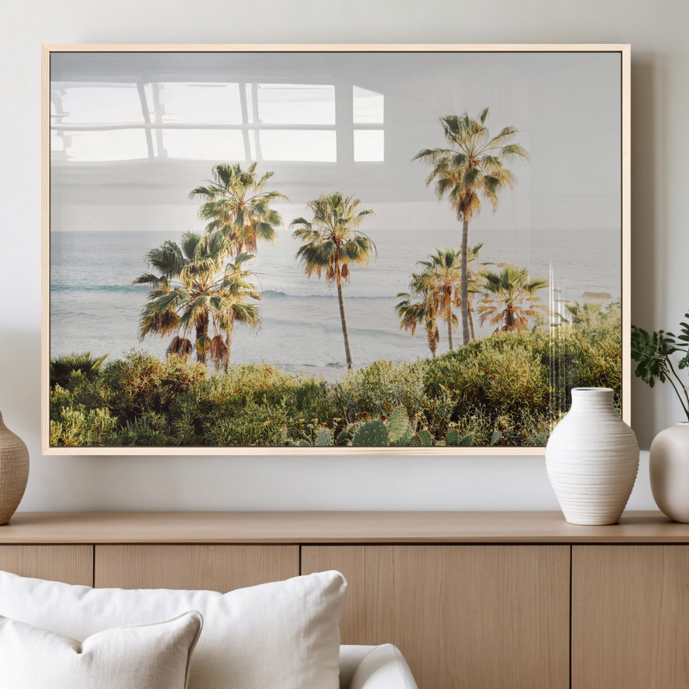 Framed print of sunlit palm trees on the California coast with warm tones, perfect for coastal minimalist or beach-style home decor.