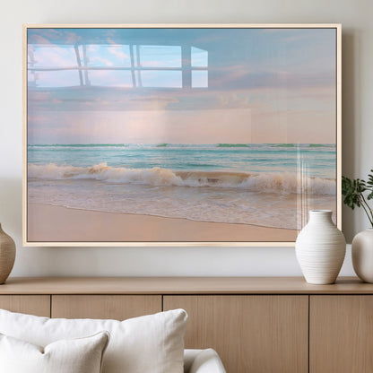 A peaceful beach scene with soft pastel skies, gentle waves washing up on the sandy shore, creating a calm and serene ocean view.