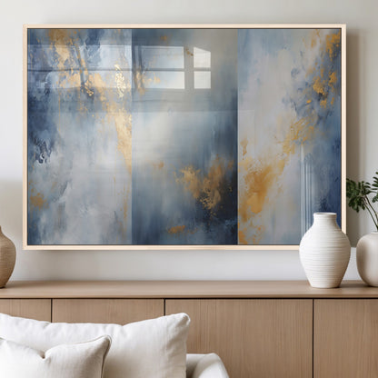 Abstract canvas art in soft blue and gold tones with textured brushstrokes, ideal for elegant or modern neutral decor spaces.