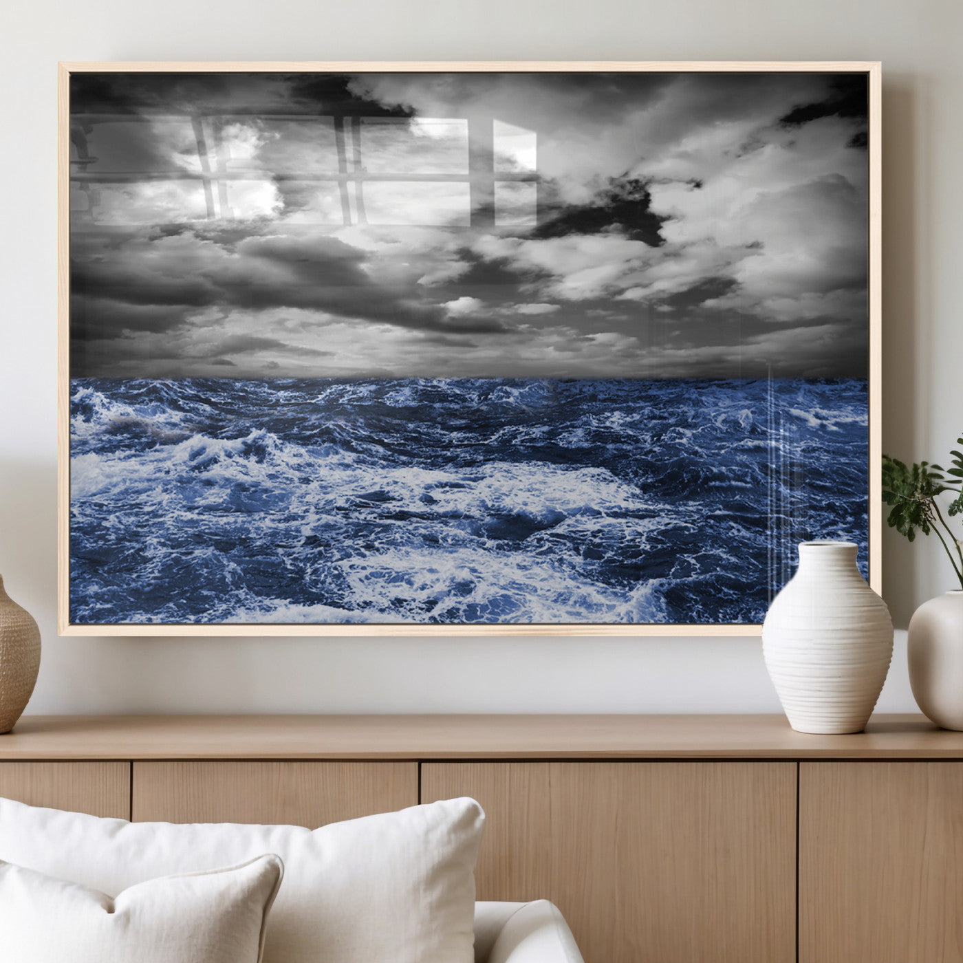 Moody canvas wall art of a stormy ocean under a dramatic black-and-white sky, perfect for bold or coastal-style interiors.