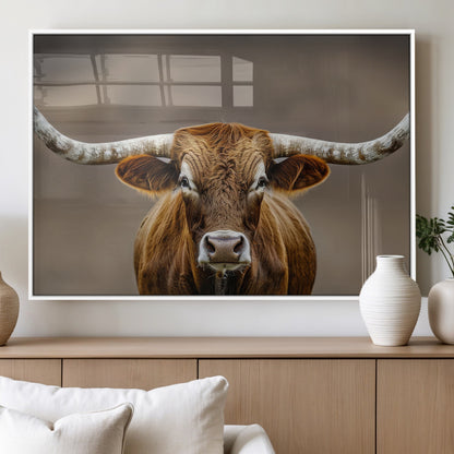 Close-up of a Texas Longhorn with strong curved horns and warm brown tones, perfect for rustic or western-style wall decor.