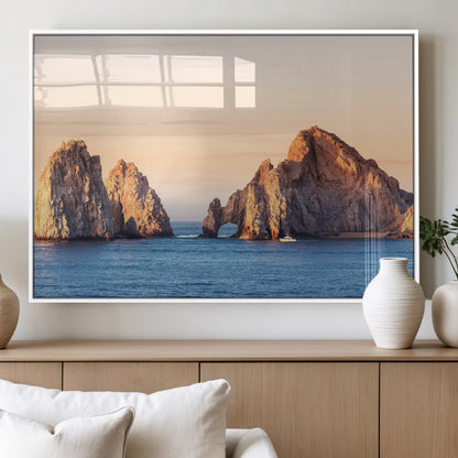 Framed canvas of El Arco rock formation in Cabo San Lucas at golden hour, ideal for coastal landmark or ocean-inspired decor.