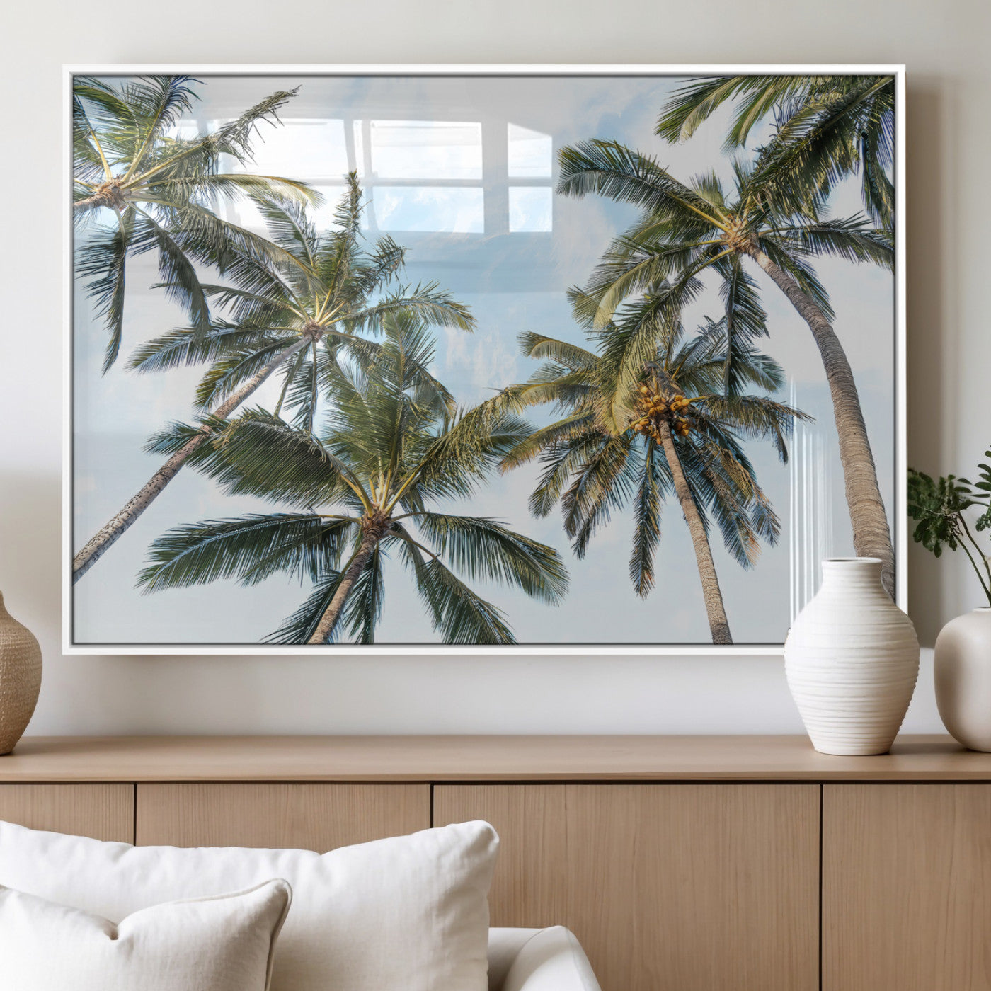 Framed canvas of tall palm trees reaching into a tropical sky, ideal for beach home or relaxed island-inspired wall decor.
