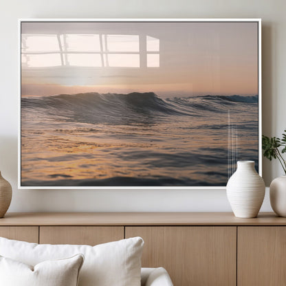 Framed canvas of ocean waves glowing in sunset light, ideal for golden hour calm or peaceful coastal-inspired wall decor.