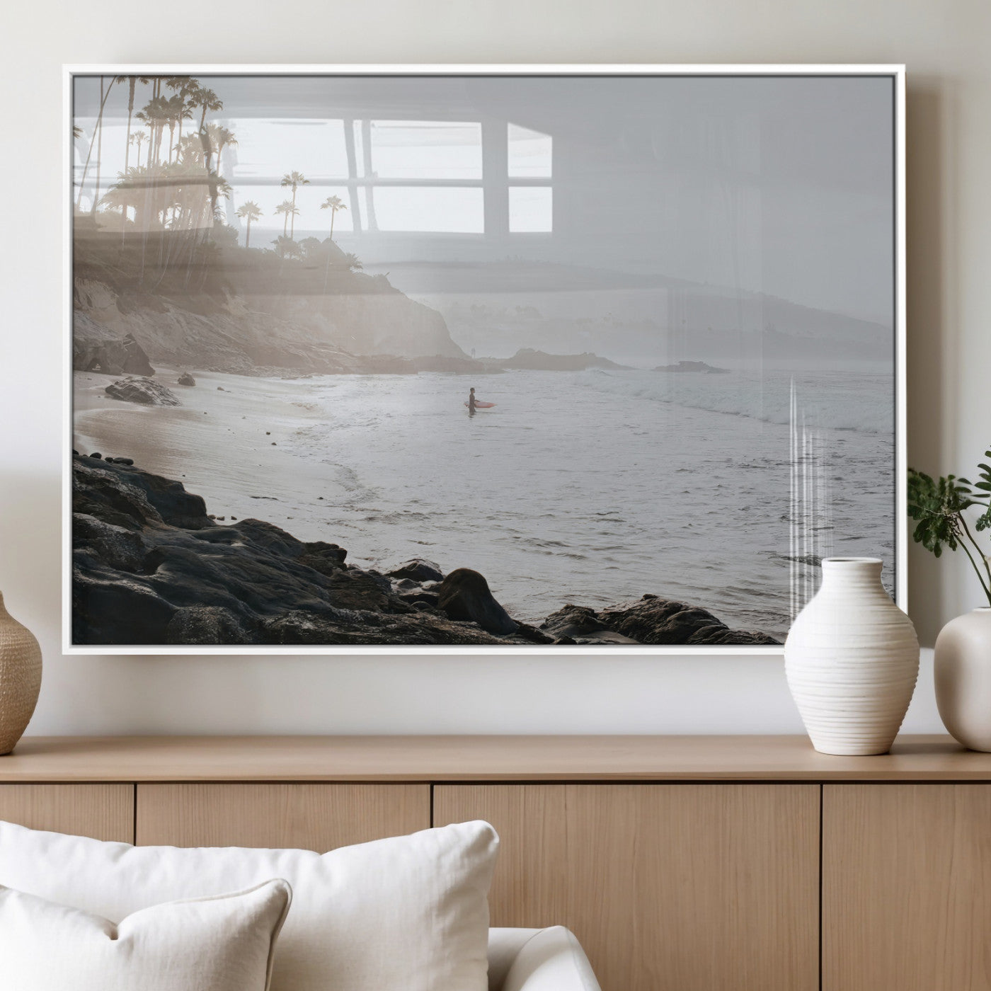 Framed canvas of a surfer in misty coastal tones at a foggy California beach, ideal for minimalist coastal beach or serene ocean-themed decor.