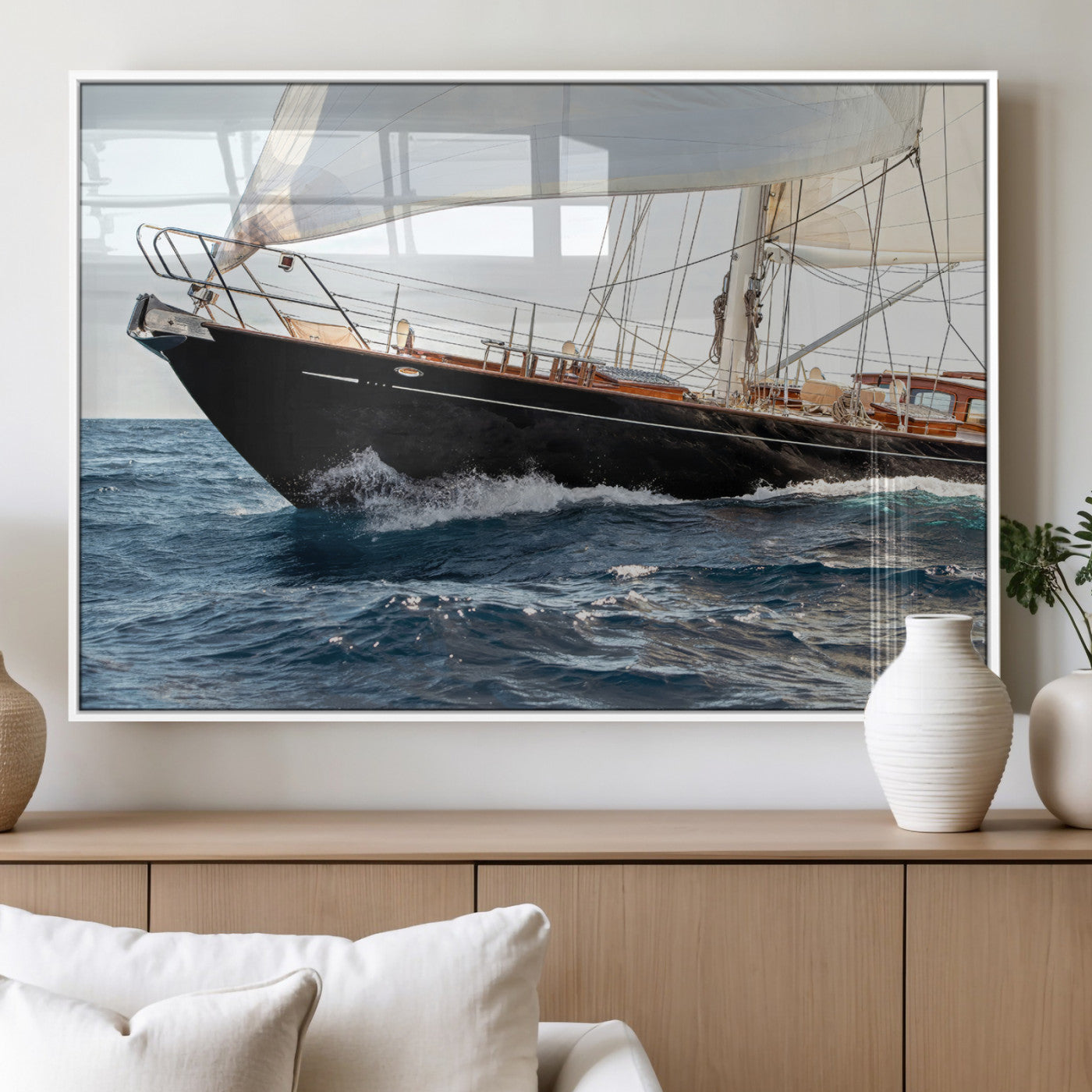 Close-up of a classic sailing yacht with wooden deck and full sails, perfect for nautical or coastal-style decor in ocean-themed spaces.