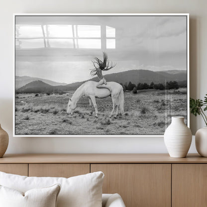 Black and white photo of a woman on a white horse in moody tones, ideal for Western Boho or modern rustic-style home decor.