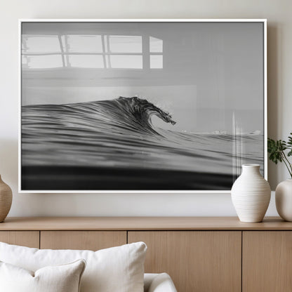 Striking black and white photo of a curling wave, ideal for modern coastal or minimalist wall decor settings.