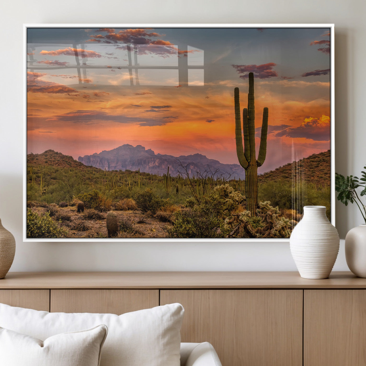 Vibrant desert sunset with saguaro cacti and distant mountains, perfect for Southwestern or warm-toned home decor.