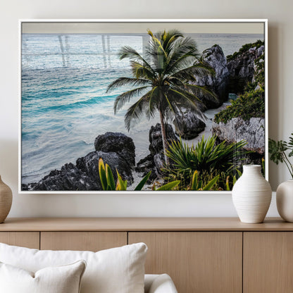 Framed canvas of a vibrant tropical coastline with palm trees, rocky cliffs, and turquoise waters, ideal for tropical coastal home decor.