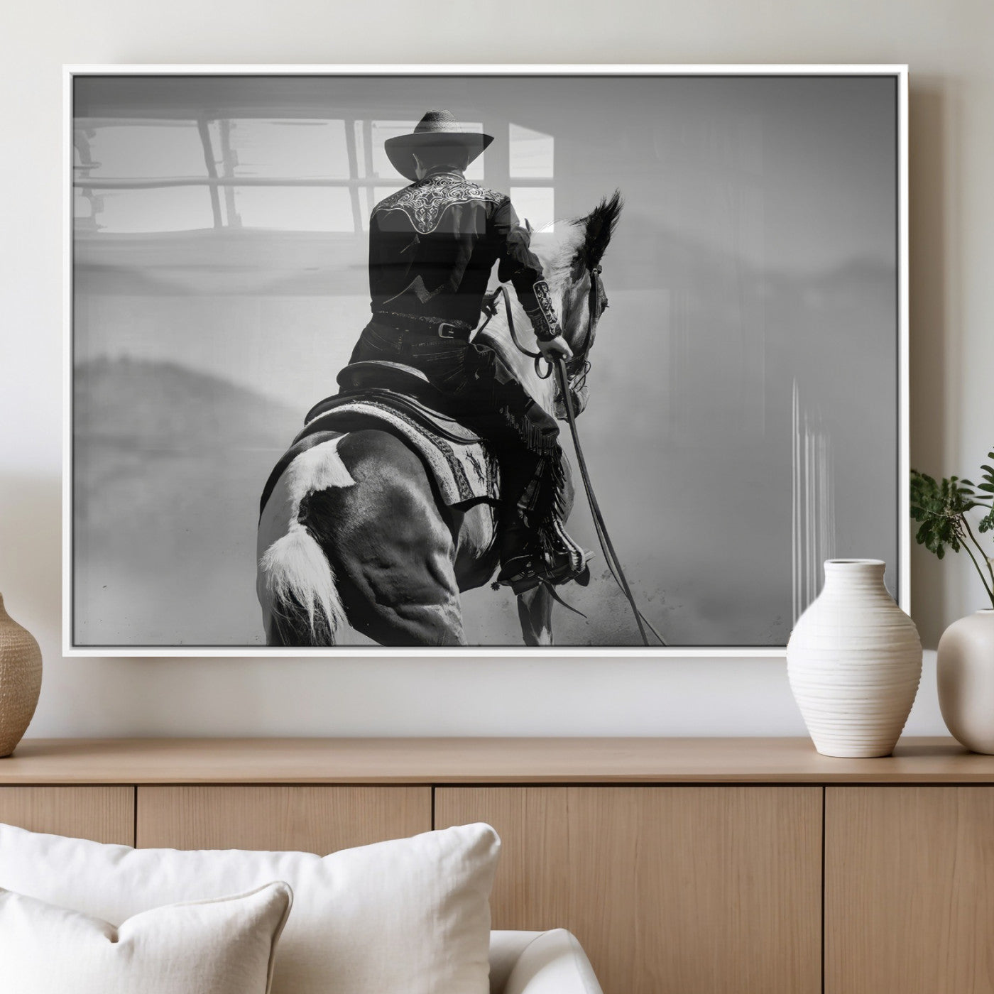 Black and white canvas of a cowboy on horseback with moody tones, perfect for rustic western or country-inspired home decor.