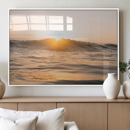 Ocean waves glowing under a warm golden sunset, reflecting soft light and calm movement, perfect for warm minimalist coastal interiors.