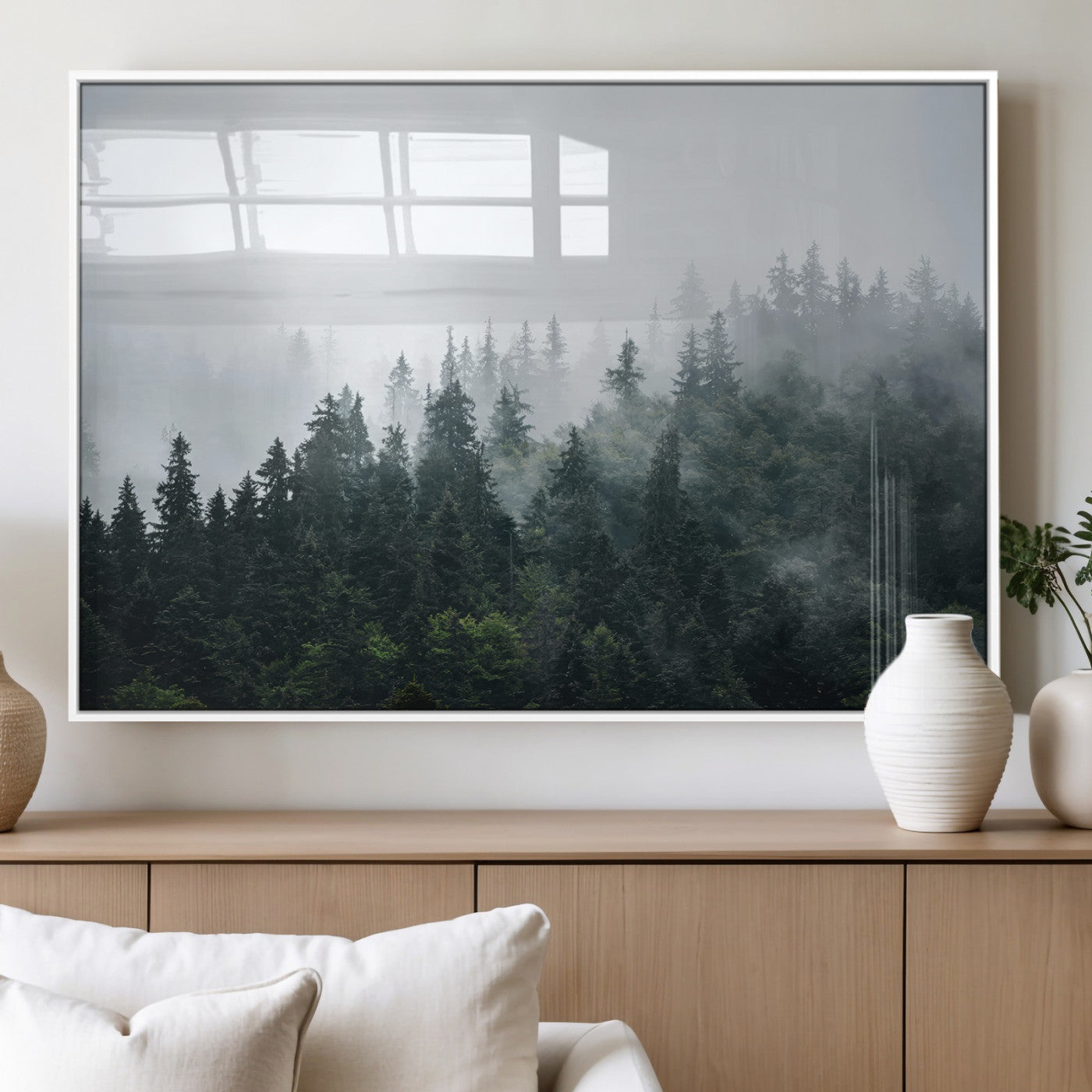 A misty evergreen forest shrouded in soft fog, creating a tranquil and moody landscape with lush green trees fading into the distance.