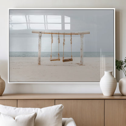 A rustic wooden beach swing stands on a serene sandy shore with an ocean horizon in the background, creating a tranquil and dreamy coastal escape.