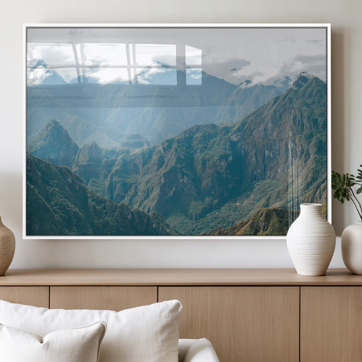 A misty mountain landscape with cloud-covered Andean peaks and lush green valleys, creating a dramatic and serene view, perfect for rustic or nature-inspired home decor.