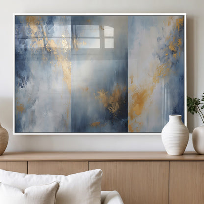 Abstract canvas art in soft blue and gold tones with textured brushstrokes, ideal for elegant or modern neutral decor spaces.