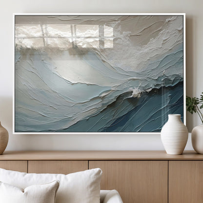 Textured canvas of ocean waves in soft coastal blues and creamy whites, ideal for modern or minimalist coastal-style interiors.