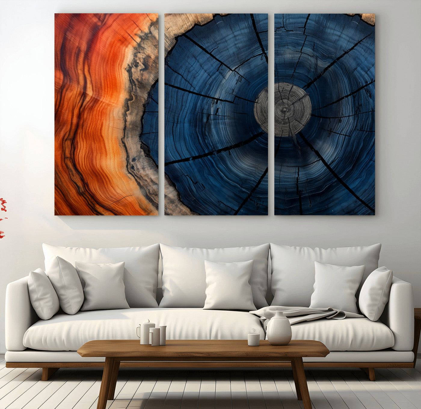 A captivating close-up of a tree trunk, showcasing its concentric rings in rich shades of blue, orange, and brown, highlighting the organic patterns of natural wood.