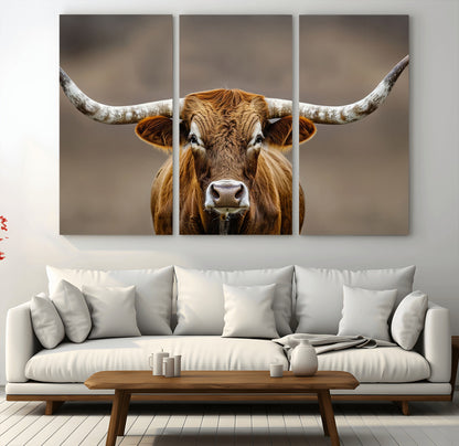 Close-up of a Texas Longhorn with strong curved horns and warm brown tones, perfect for rustic or western-style wall decor.