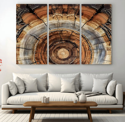 Canvas of tree rings and natural wood grain in earthy tones, ideal for rustic or vintage-inspired home decor with organic textures.